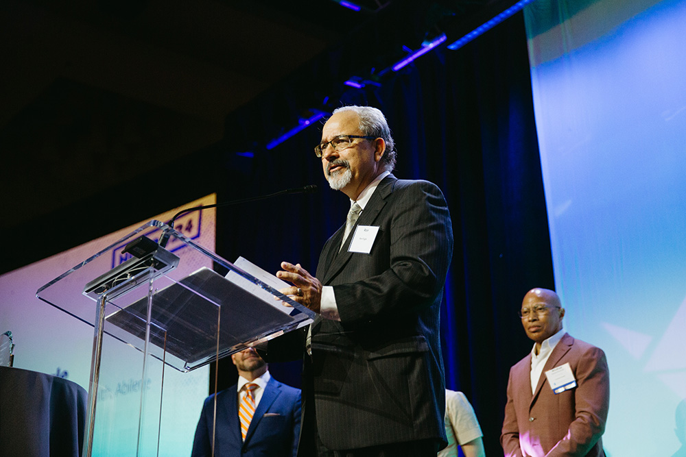 Ron Fogle spoke to the crowd after being presented with the THT 2024 Founders Award during the 2024 Healthcare Governance Conference